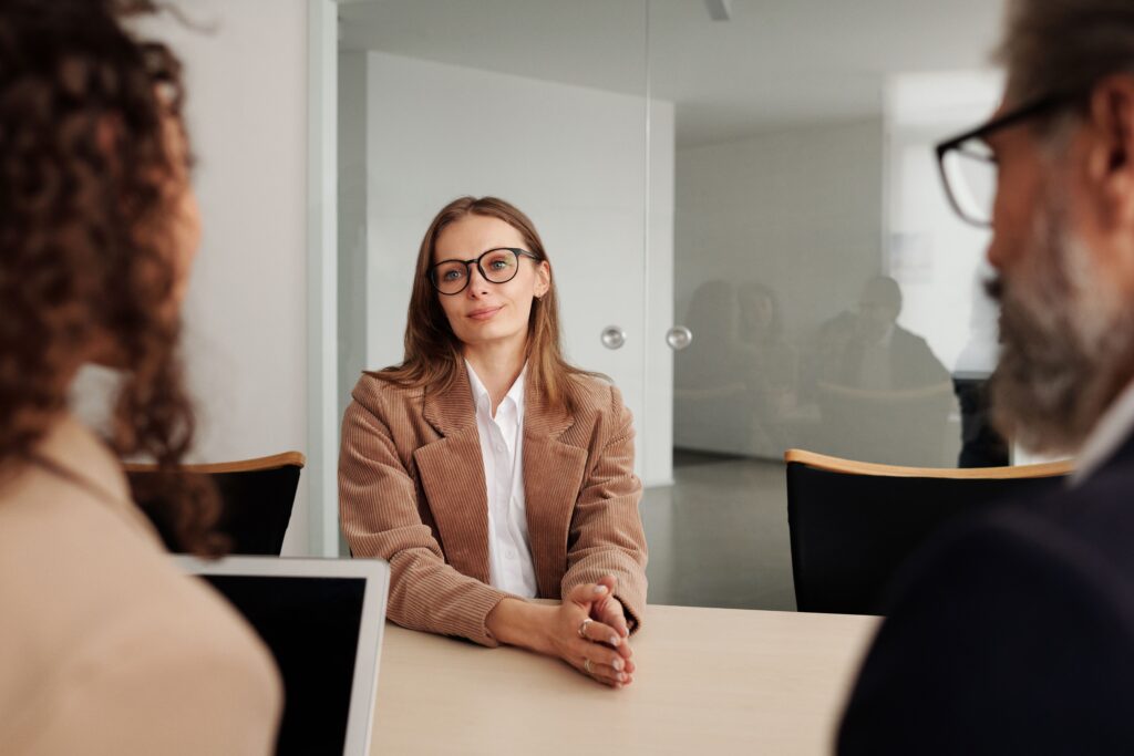 A hiring manager conducting a structured candidate interview as part of the 5 C's of recruitment evaluation framework